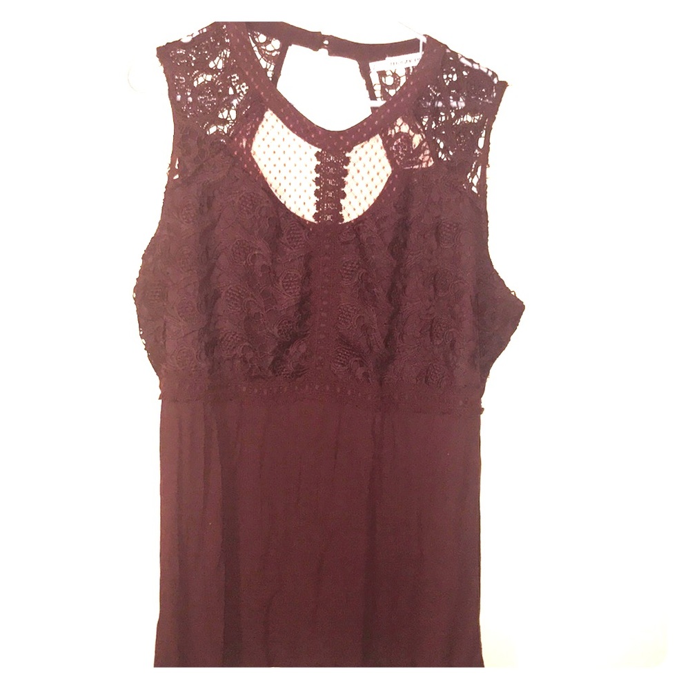Feminine burgundy sleeveless blouse